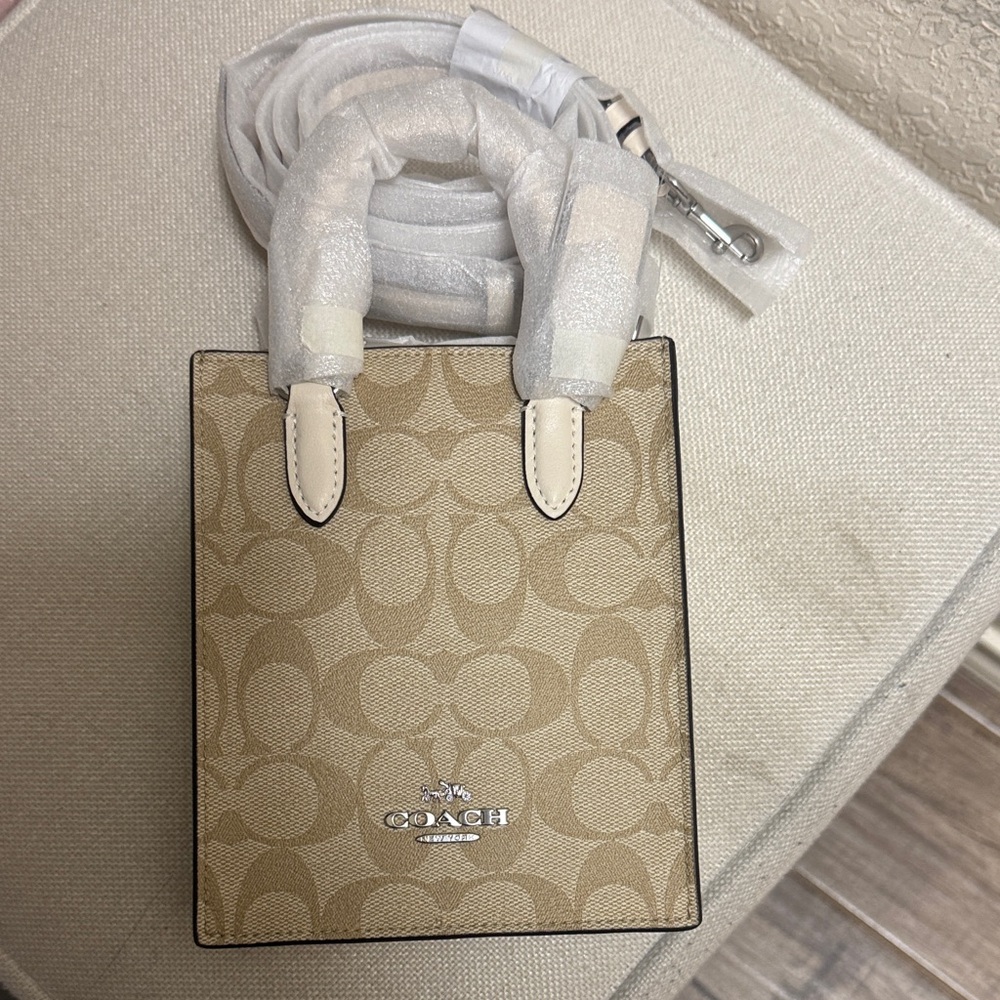 CJ494	Coach	North South Mini Tote In Signature Canvas